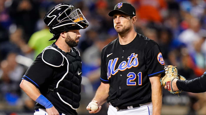 Mets starting pitcher Max Scherzer waits on the mound.